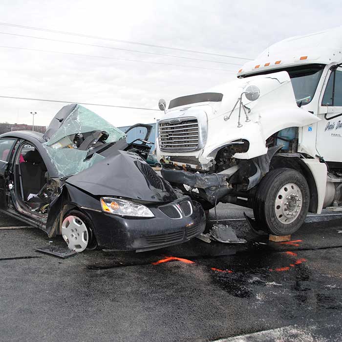 serious car and semi truck wreck with injuries