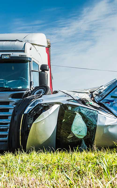 car vs semi truck accident on rural road